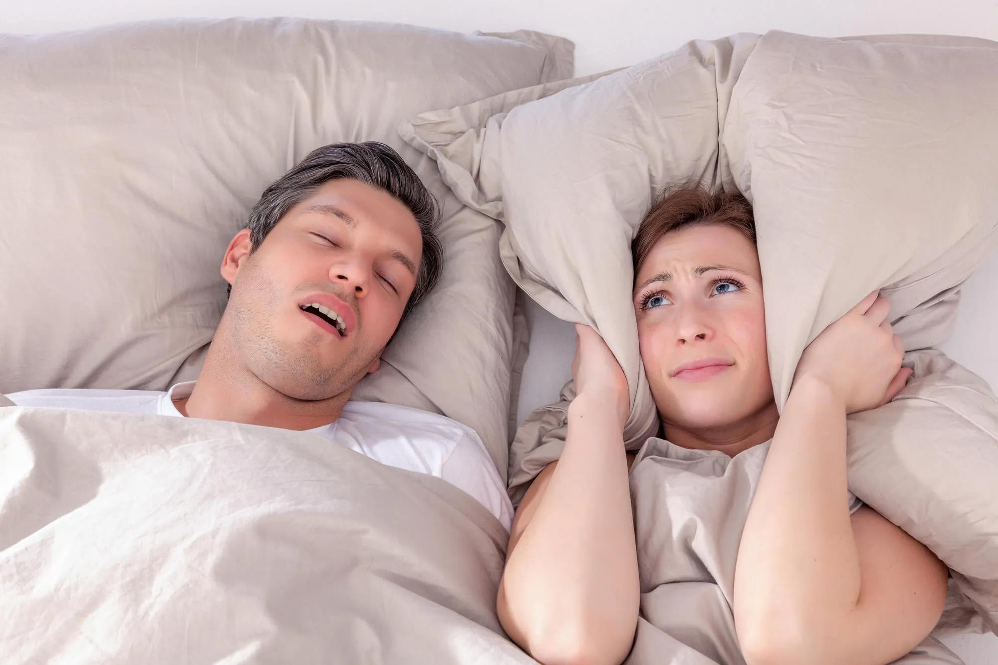 man snoring from sleep apnea
