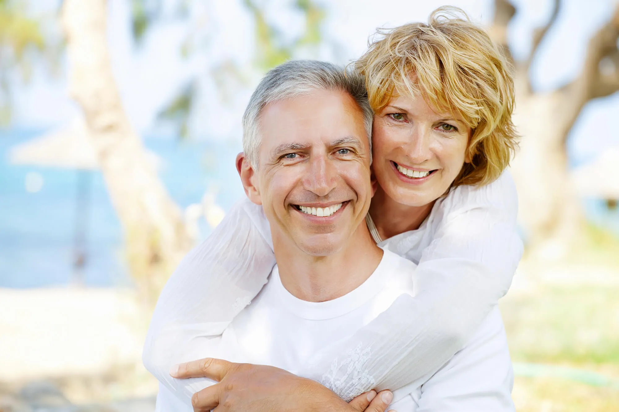 happy couple wearing dentures